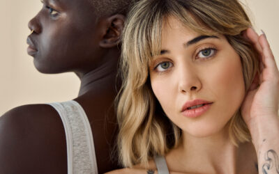 Gen z diverse girls beauty models faces on beige background, close up portrait.